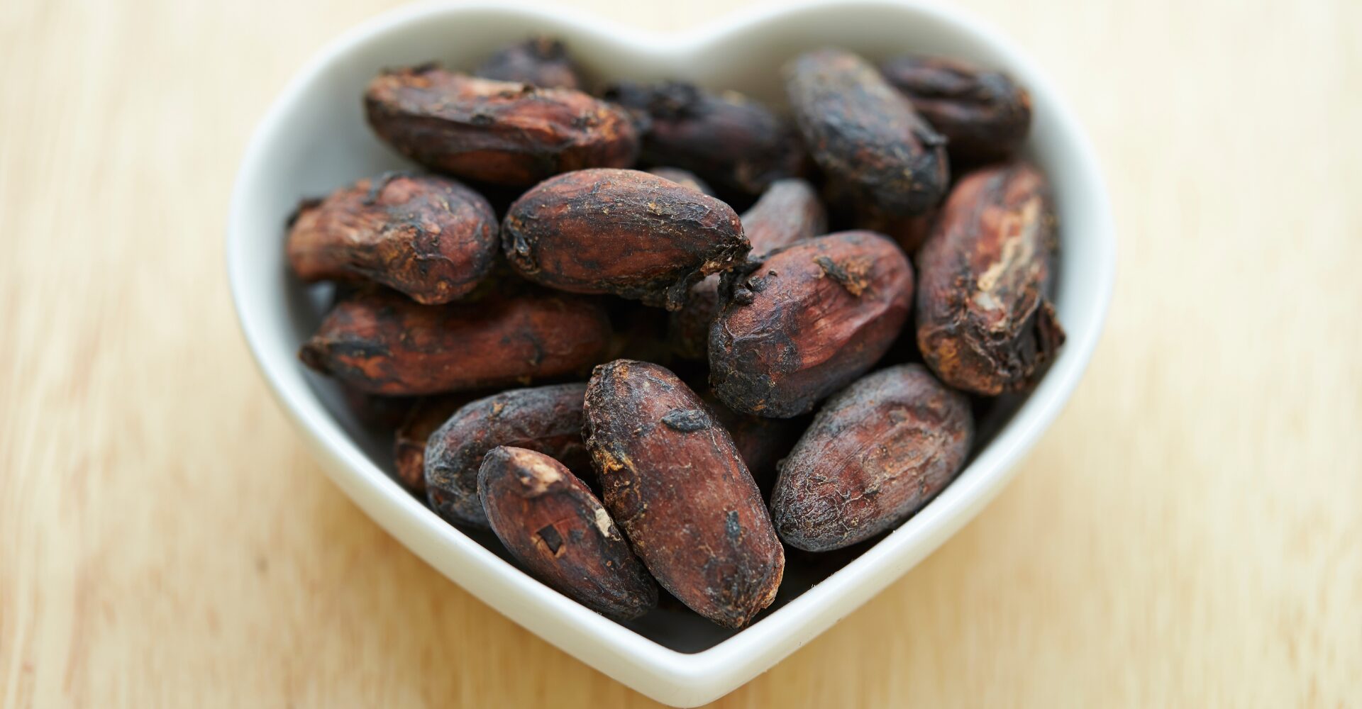cacao nibs in a heart shaped dish
