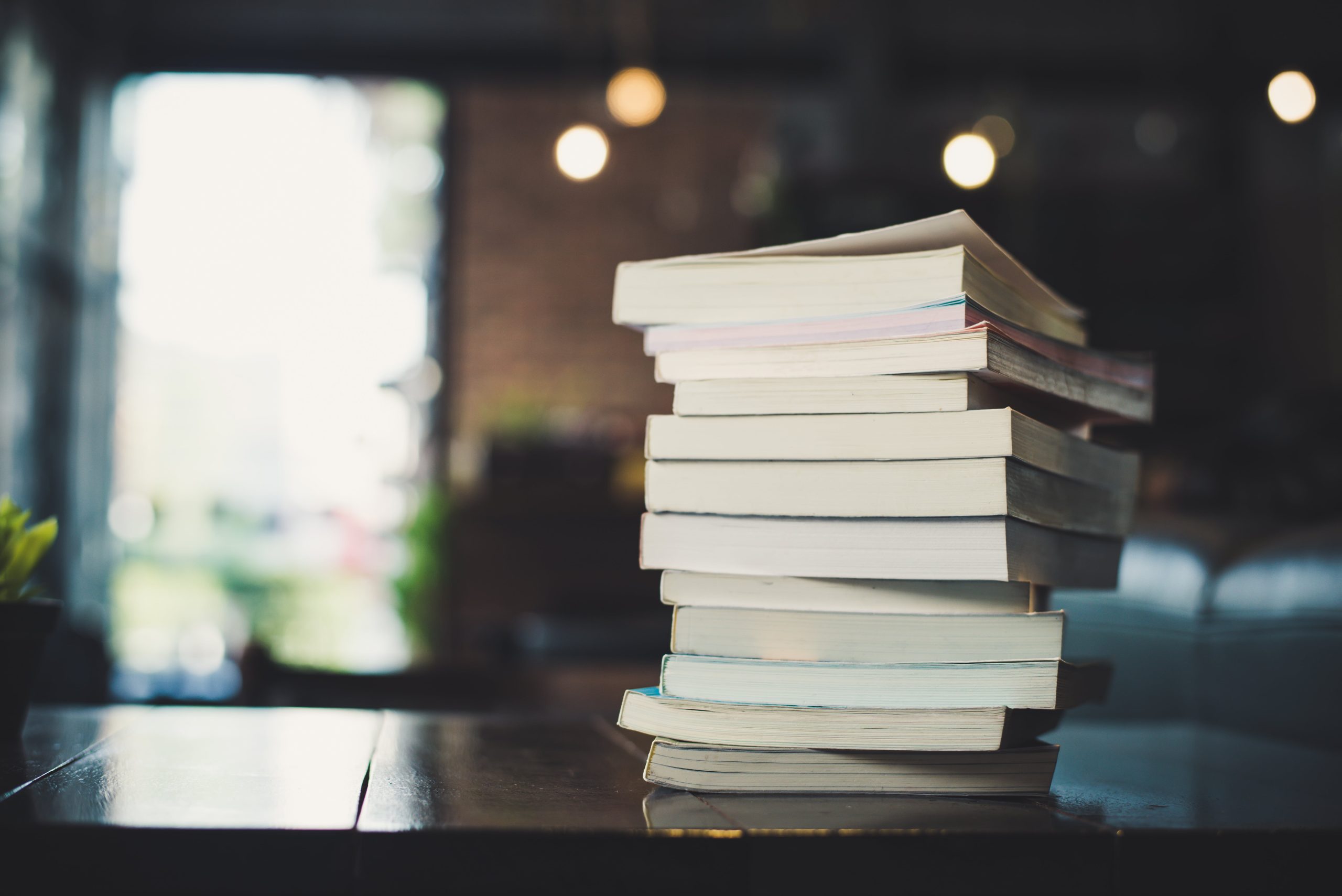 Swapping scrolling on your phone before bed with reading a book can be a great, specific New Year's Resolution.