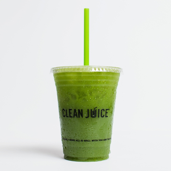 Green Glow juice in a Clean Juice cup with a green straw